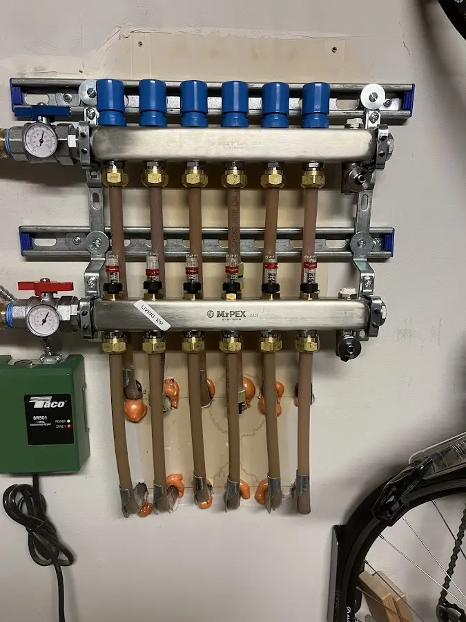 Plumber performing Water Heater Repair at a residential property in Oceanport